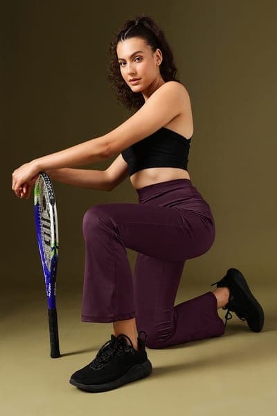 High Waist Flared Yoga Pants in Purple Colour with Side Pockets High Waist Flared Yoga Pants in Purple Colour with Side Pockets